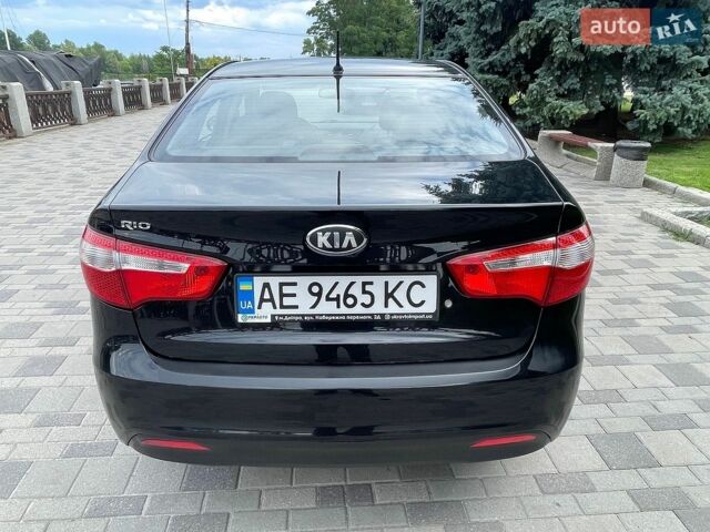 Черный Киа Рио, объемом двигателя 1.4 л и пробегом 89 тыс. км за 8300 $, фото 4 на Automoto.ua