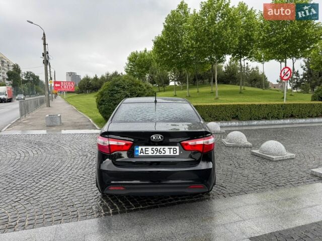 Чорний Кіа Ріо, об'ємом двигуна 1.4 л та пробігом 107 тис. км за 7500 $, фото 3 на Automoto.ua