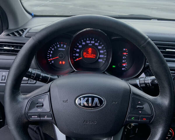 Чорний Кіа Ріо, об'ємом двигуна 1.6 л та пробігом 261 тис. км за 7650 $, фото 14 на Automoto.ua