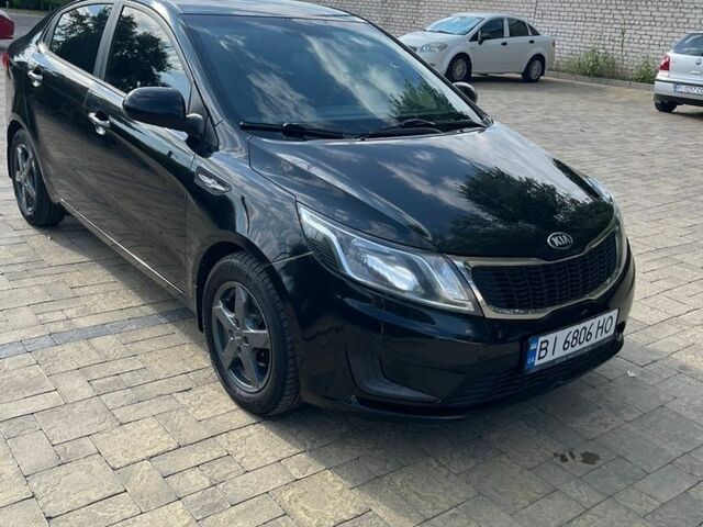 Черный Киа Рио, объемом двигателя 1.4 л и пробегом 247 тыс. км за 7800 $, фото 5 на Automoto.ua