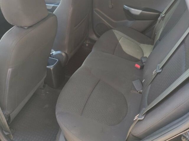 Чорний Кіа Ріо, об'ємом двигуна 1.4 л та пробігом 186 тис. км за 6800 $, фото 5 на Automoto.ua