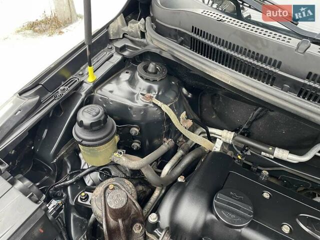 Черный Киа Рио, объемом двигателя 1.4 л и пробегом 124 тыс. км за 9350 $, фото 139 на Automoto.ua