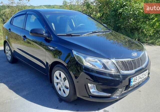 Черный Киа Рио, объемом двигателя 1.4 л и пробегом 121 тыс. км за 8600 $, фото 6 на Automoto.ua