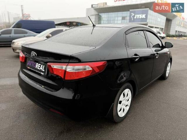 Черный Киа Рио, объемом двигателя 1.4 л и пробегом 220 тыс. км за 8200 $, фото 20 на Automoto.ua
