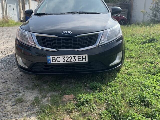 Черный Киа Рио, объемом двигателя 1.4 л и пробегом 212 тыс. км за 7800 $, фото 2 на Automoto.ua