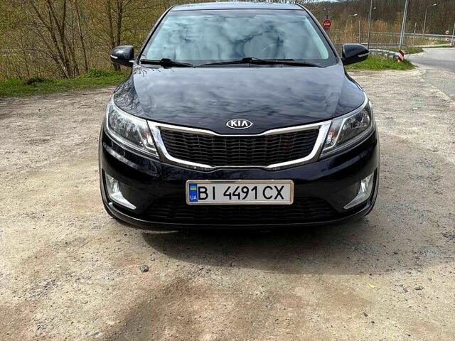 Черный Киа Рио, объемом двигателя 1.6 л и пробегом 154 тыс. км за 8000 $, фото 2 на Automoto.ua