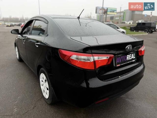 Черный Киа Рио, объемом двигателя 1.4 л и пробегом 220 тыс. км за 8200 $, фото 23 на Automoto.ua