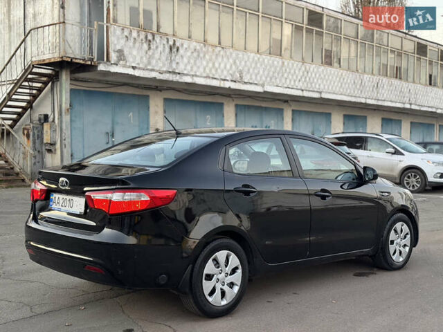 Черный Киа Рио, объемом двигателя 1.4 л и пробегом 305 тыс. км за 4950 $, фото 5 на Automoto.ua