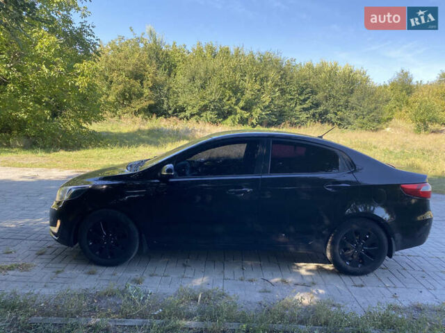 Черный Киа Рио, объемом двигателя 1.59 л и пробегом 194 тыс. км за 6700 $, фото 7 на Automoto.ua