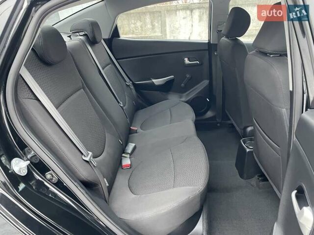 Черный Киа Рио, объемом двигателя 1.4 л и пробегом 124 тыс. км за 9350 $, фото 121 на Automoto.ua