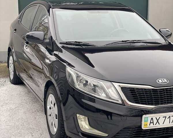 Черный Киа Рио, объемом двигателя 1.4 л и пробегом 124 тыс. км за 9350 $, фото 63 на Automoto.ua