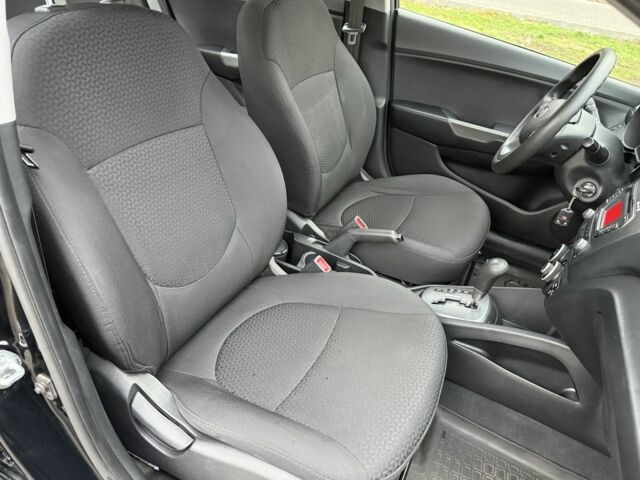 Чорний Кіа Ріо, об'ємом двигуна 1.4 л та пробігом 45 тис. км за 9800 $, фото 18 на Automoto.ua