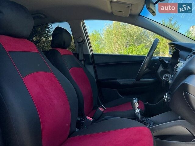 Черный Киа Рио, объемом двигателя 1.4 л и пробегом 215 тыс. км за 6999 $, фото 15 на Automoto.ua