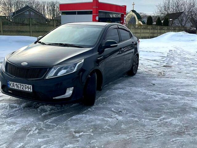 Чорний Кіа Ріо, об'ємом двигуна 1.6 л та пробігом 320 тис. км за 6500 $, фото 5 на Automoto.ua