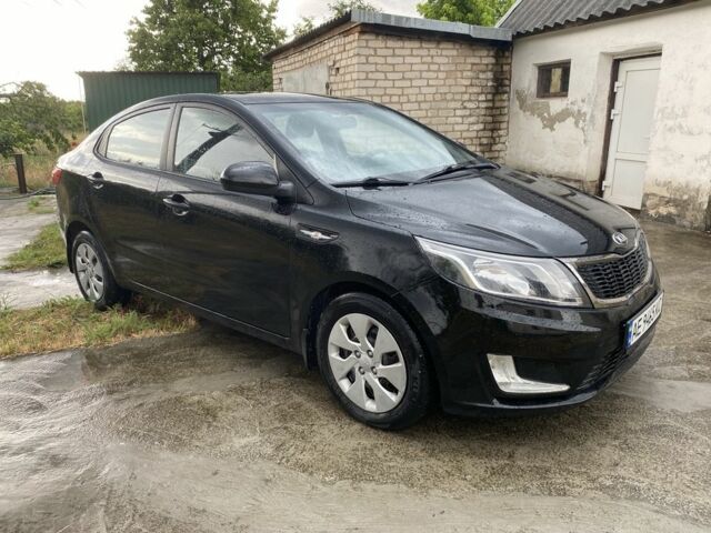 Чорний Кіа Ріо, об'ємом двигуна 1.4 л та пробігом 88 тис. км за 8300 $, фото 5 на Automoto.ua