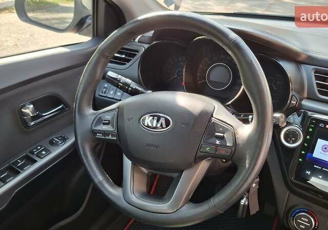 Черный Киа Рио, объемом двигателя 1.6 л и пробегом 130 тыс. км за 8750 $, фото 29 на Automoto.ua