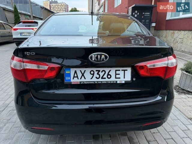 Чорний Кіа Ріо, об'ємом двигуна 1.4 л та пробігом 87 тис. км за 7700 $, фото 7 на Automoto.ua