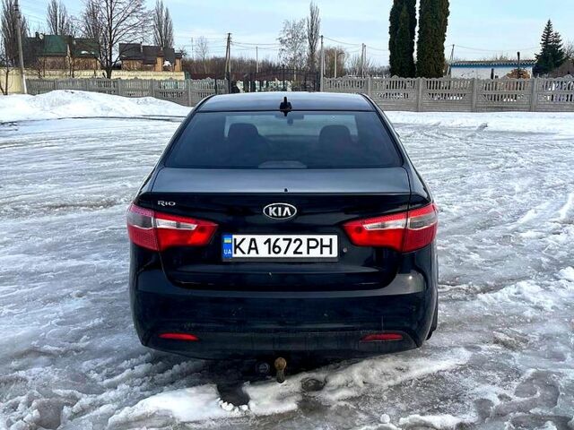 Чорний Кіа Ріо, об'ємом двигуна 1.6 л та пробігом 320 тис. км за 6500 $, фото 3 на Automoto.ua
