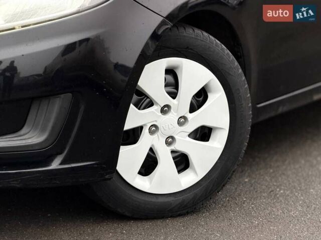 Черный Киа Рио, объемом двигателя 1.4 л и пробегом 220 тыс. км за 8200 $, фото 4 на Automoto.ua