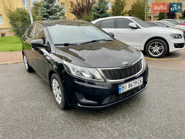 Чорний Кіа Ріо, об'ємом двигуна 1.4 л та пробігом 136 тис. км за 7950 $, фото 15 на Automoto.ua