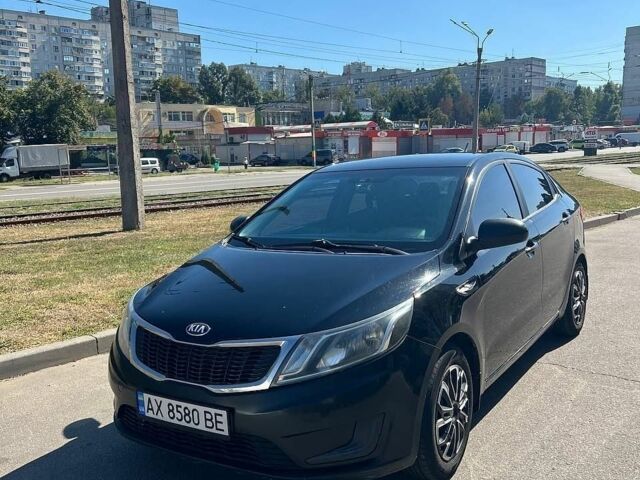 Черный Киа Рио, объемом двигателя 1.4 л и пробегом 200 тыс. км за 6500 $, фото 4 на Automoto.ua