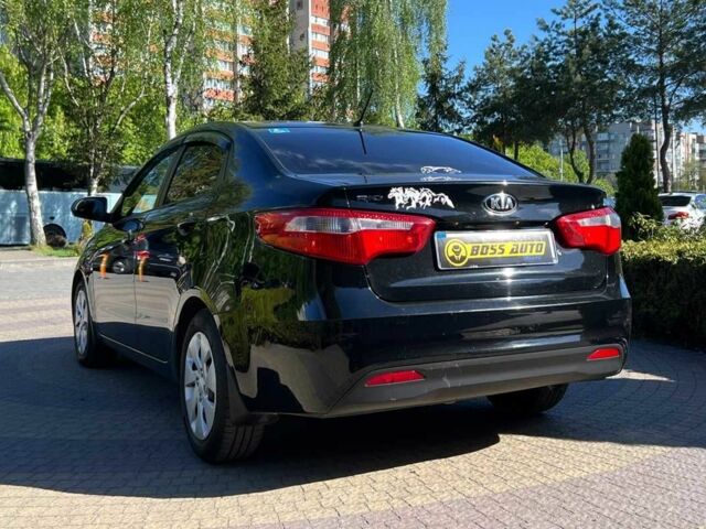 Черный Киа Рио, объемом двигателя 1.4 л и пробегом 215 тыс. км за 6999 $, фото 4 на Automoto.ua