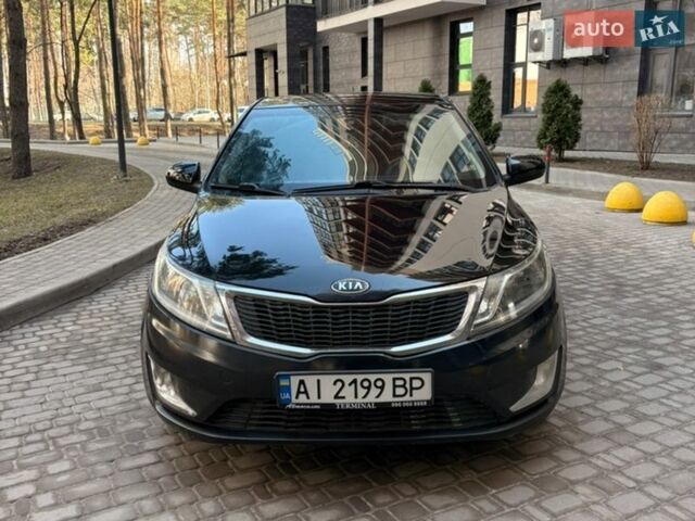 Чорний Кіа Ріо, об'ємом двигуна 1.6 л та пробігом 272 тис. км за 5950 $, фото 2 на Automoto.ua