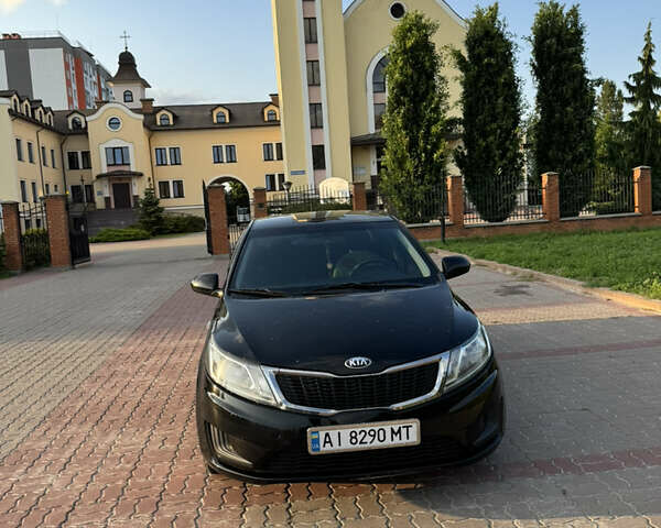 Черный Киа Рио, объемом двигателя 1.4 л и пробегом 183 тыс. км за 7000 $, фото 1 на Automoto.ua