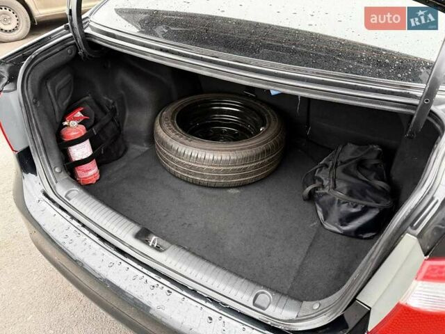 Черный Киа Рио, объемом двигателя 1.4 л и пробегом 220 тыс. км за 8200 $, фото 26 на Automoto.ua