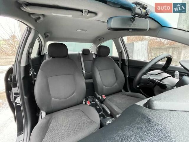 Черный Киа Рио, объемом двигателя 1.4 л и пробегом 124 тыс. км за 9350 $, фото 67 на Automoto.ua