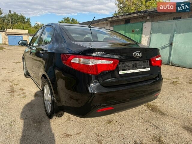 Черный Киа Рио, объемом двигателя 1.6 л и пробегом 61 тыс. км за 10300 $, фото 5 на Automoto.ua