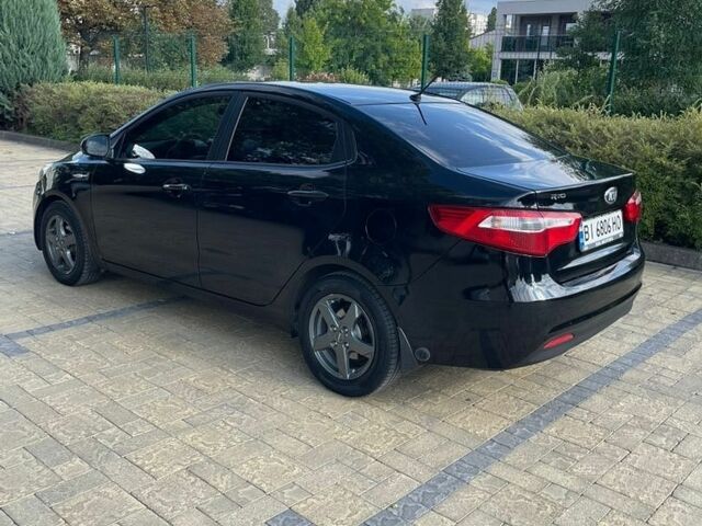Черный Киа Рио, объемом двигателя 1.4 л и пробегом 247 тыс. км за 7800 $, фото 1 на Automoto.ua