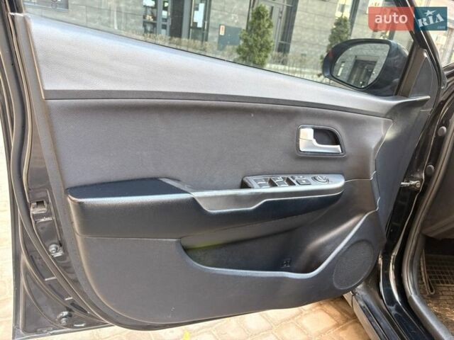 Чорний Кіа Ріо, об'ємом двигуна 1.6 л та пробігом 272 тис. км за 5950 $, фото 12 на Automoto.ua