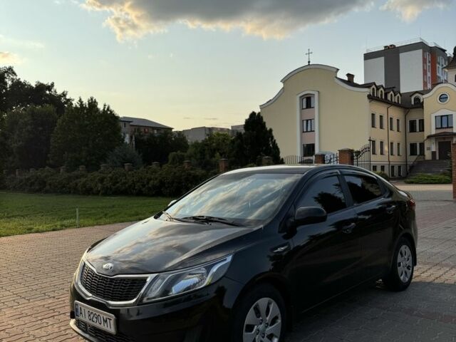Черный Киа Рио, объемом двигателя 1.4 л и пробегом 185 тыс. км за 5777 $, фото 2 на Automoto.ua