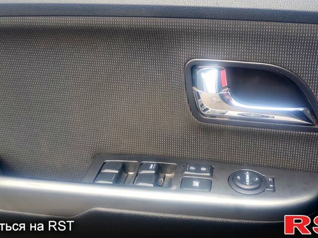Чорний Кіа Ріо, об'ємом двигуна 1.6 л та пробігом 91 тис. км за 7800 $, фото 6 на Automoto.ua