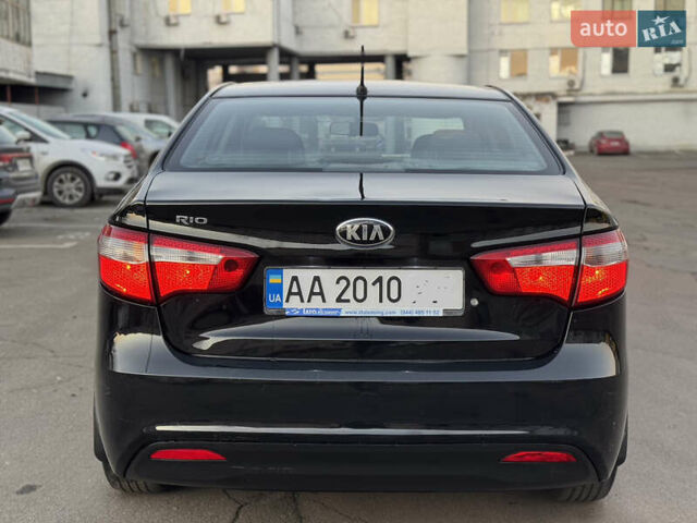 Черный Киа Рио, объемом двигателя 1.4 л и пробегом 305 тыс. км за 4950 $, фото 7 на Automoto.ua