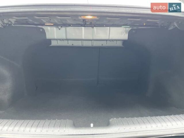 Черный Киа Рио, объемом двигателя 1.4 л и пробегом 124 тыс. км за 9350 $, фото 146 на Automoto.ua