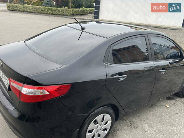Черный Киа Рио, объемом двигателя 1.4 л и пробегом 136 тыс. км за 7700 $, фото 11 на Automoto.ua