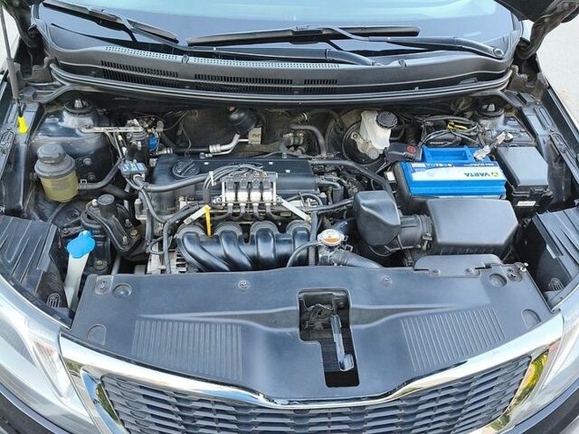 Чорний Кіа Ріо, об'ємом двигуна 1.59 л та пробігом 99 тис. км за 8800 $, фото 33 на Automoto.ua
