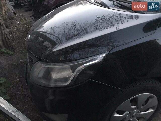 Черный Киа Рио, объемом двигателя 1.4 л и пробегом 102 тыс. км за 2600 $, фото 4 на Automoto.ua