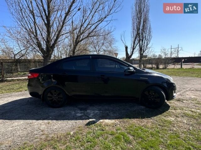 Чорний Кіа Ріо, об'ємом двигуна 1.59 л та пробігом 329 тис. км за 6000 $, фото 3 на Automoto.ua