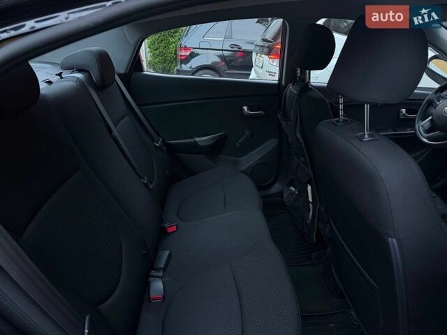 Чорний Кіа Ріо, об'ємом двигуна 1.4 л та пробігом 87 тис. км за 7700 $, фото 11 на Automoto.ua