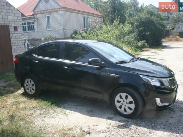 Черный Киа Рио, объемом двигателя 1.37 л и пробегом 45 тыс. км за 9000 $, фото 1 на Automoto.ua
