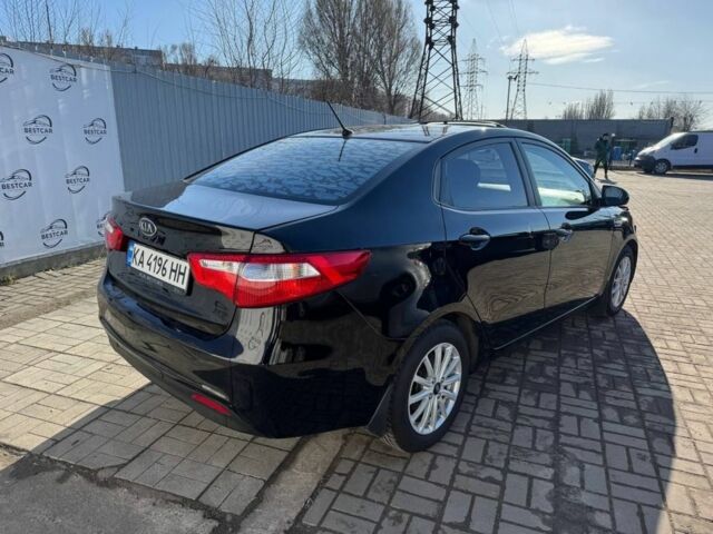 Чорний Кіа Ріо, об'ємом двигуна 1.4 л та пробігом 214 тис. км за 7700 $, фото 3 на Automoto.ua