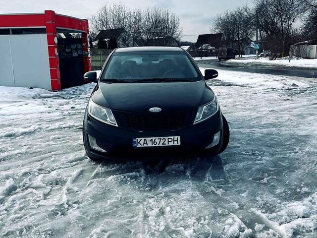 Чорний Кіа Ріо, об'ємом двигуна 1.6 л та пробігом 320 тис. км за 6500 $, фото 1 на Automoto.ua