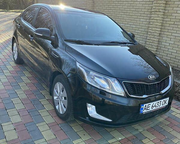 Черный Киа Рио, объемом двигателя 1.6 л и пробегом 170 тыс. км за 8600 $, фото 1 на Automoto.ua