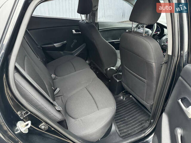 Черный Киа Рио, объемом двигателя 1.4 л и пробегом 185 тыс. км за 6999 $, фото 13 на Automoto.ua