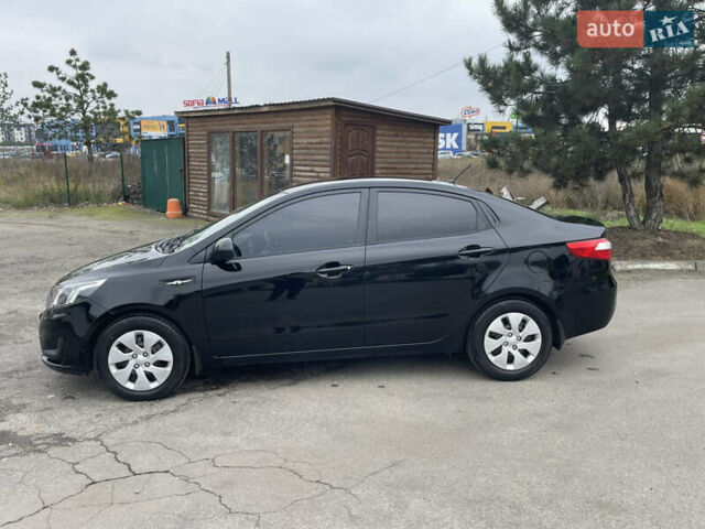 Черный Киа Рио, объемом двигателя 1.4 л и пробегом 136 тыс. км за 7700 $, фото 6 на Automoto.ua
