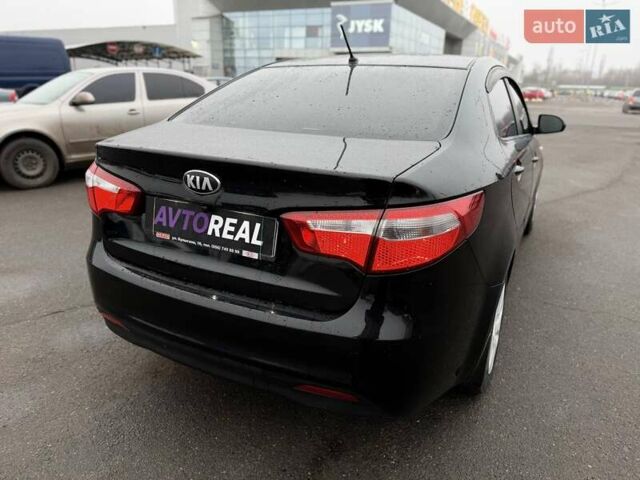 Черный Киа Рио, объемом двигателя 1.4 л и пробегом 220 тыс. км за 8200 $, фото 21 на Automoto.ua