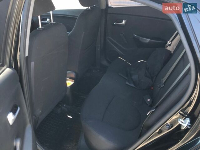 Чорний Кіа Ріо, об'ємом двигуна 1.4 л та пробігом 177 тис. км за 6800 $, фото 9 на Automoto.ua
